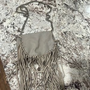 Gray Zara fringed leather bag.